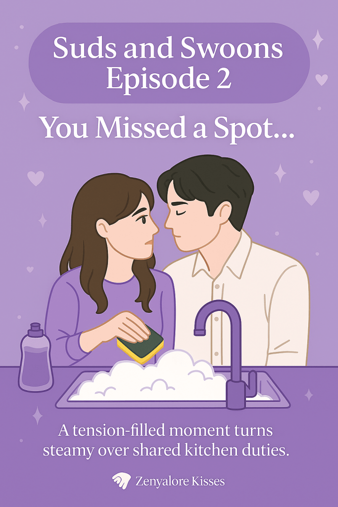 A pastel purple promotional image for Suds and Swoons – Episode 2. The title text at the top reads “You Missed a Spot…” beneath the episode header. Below, a manga-style illustration shows a woman holding a sponge at a soapy kitchen sink, staring closely at a man in a white shirt. They’re leaning toward each other, faces inches apart, with soft romantic tension. The background is decorated with hearts and sparkles. Text at the bottom reads: “A tension-filled moment turns steamy over shared kitchen duties.” The Zenyalore Kisses blog badge is also displayed.