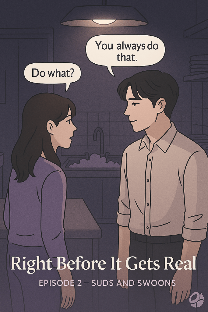 A manga-style digital illustration from Suds and Swoons – Episode 2. In a softly lit, shadowy dishroom, Seo Ah and Jun-Hwan stand facing each other near the sink. Seo Ah wears a purple long-sleeved shirt and looks slightly guarded. Jun-Hwan, in a light button-up, gazes at her with a gentle, knowing expression. Above their heads, dialogue bubbles read:
Jun-Hwan: “You always do that.”
Seo Ah: “Do what?”
At the bottom, the text overlay reads: Right Before It Gets Real – Episode 2: Suds and Swoons.
The atmosphere is quiet, intimate, and emotionally charged.